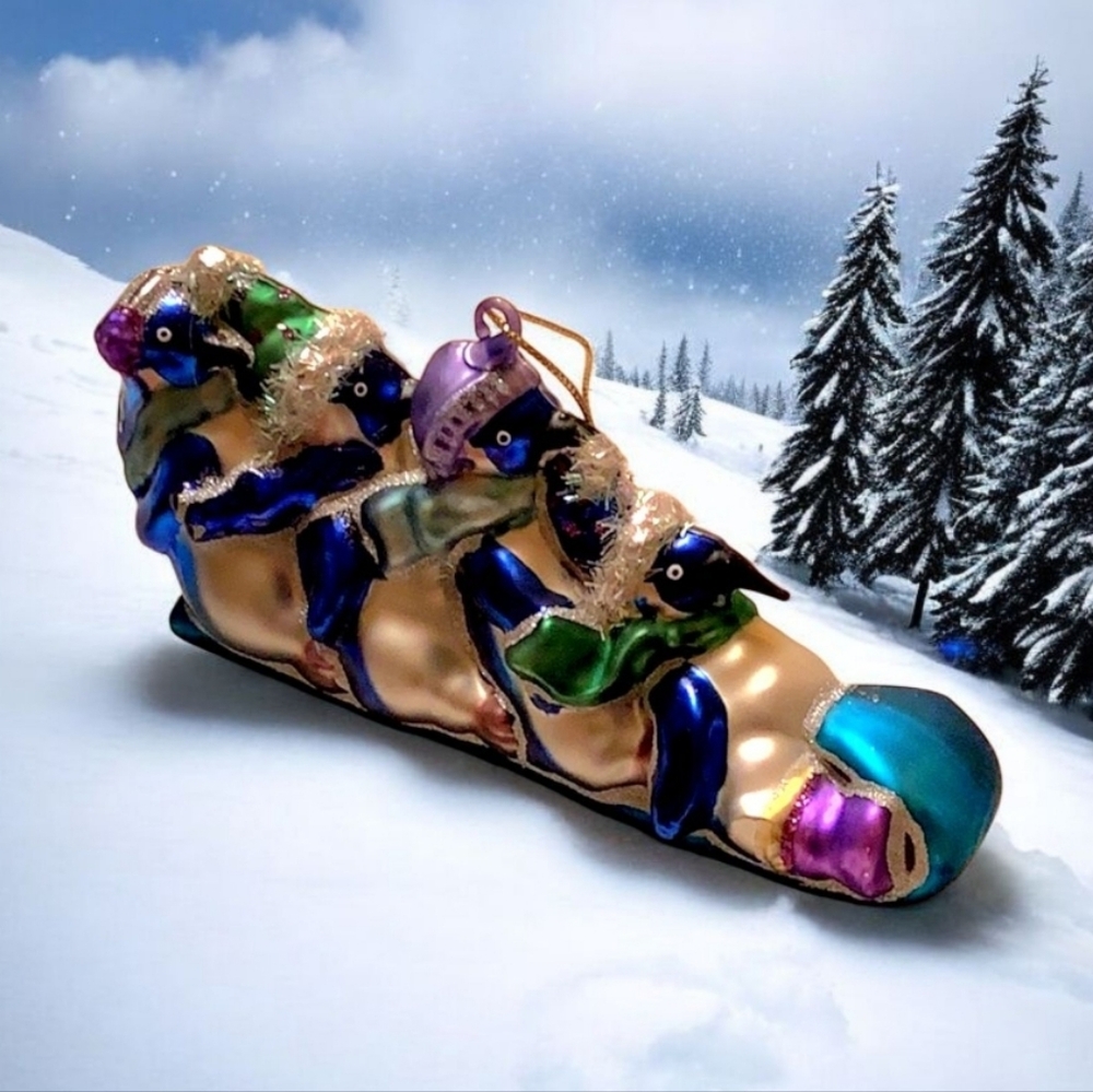 Penguin Christmas Ornament blue silver purple on sled glass